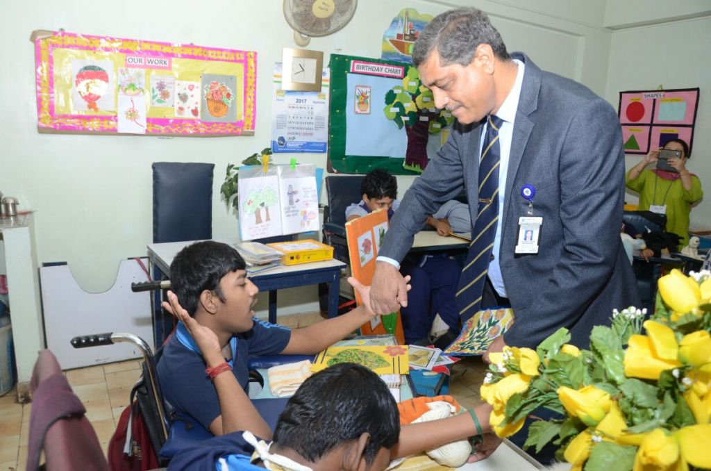 Image 4 - Presentation to cheque to Indian Institute of Cerebral Palsy